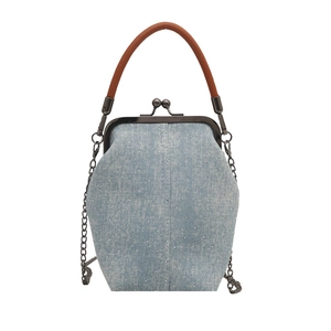 Retro denim crossbody bag with silver studs, brown handle, and metal chain strap