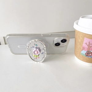 Glittery tulip flower expandable phone socket grip on clear case with lifestyle background