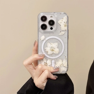 Detail of floral iPhone case with real dried flowers, gold flakes and MagSafe ring