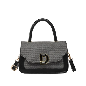 Borsa a tracolla retrò bicolore in pelle nera e tessuto grigio con fibbia dorata a D