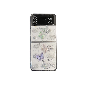 Sparkly Z Flip6 case with pearly butterflies, white glitter and silver foil accents