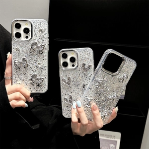 Sparkly iPhone case with 3D silver bow heart and bear charms on glitter backplate
