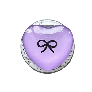 Purple heart-shaped magnetic phone socket with black bow design on white background
