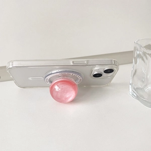 Pink pearlescent sphere magnetic phone grip with Gift For You print on clear base