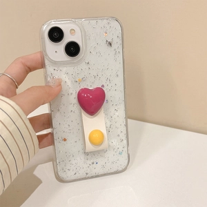Nahaufnahme der Glitzer-iPhone-Hülle mit rosa Herzständer und Silber-Pailletten