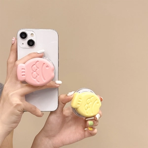 Close-up of a 3D fish-shaped phone grip with embossed texture and Gift For You text