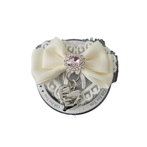 Lace bow phone grip with pink rhinestone heart pendant on Magsafe bracket
