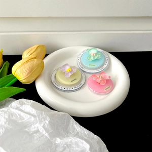 Detailed view of three cute magnetic glitter bear phone grips in mint green, purple and pink