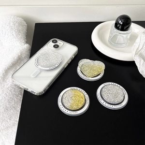 Detail of glitter heart and round phone sockets with Gift For You printed base