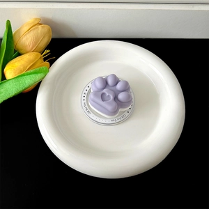 Detailed view of a cute purple 3D cat paw phone grip featuring a heart motif design.