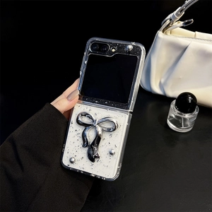 Silver foil Samsung Z Flip5 case with large metallic bow and glitter finish