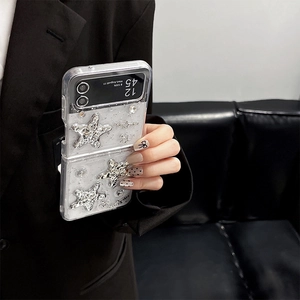 Close-up of Galaxy Z Flip case with 3D silver stars and fine glitter decoration