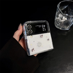 Detail of transparent glitter phone case with pearl hearts and silver stars for Z Flip 5