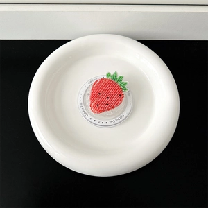 Detail of handmade beaded strawberry brooch on Gift For You display card holder