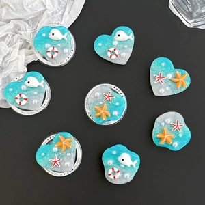 Marine theme phone socket set with dolphin, starfish and pearl resin designs