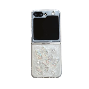 Luxury Samsung Galaxy Z Flip phone case featuring white marble texture and laser bows