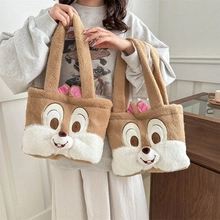 Detailed close-up of Clarice character plush mini tote bags with embroidery details