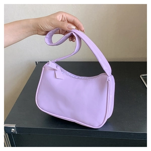 Close-up of minimalist lavender purple hobo bag with smooth PU leather finish