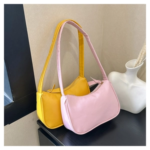 Minimalist PU leather half-moon underarm bags in pastel pink and vibrant yellow