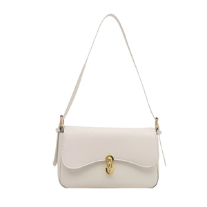 Chic beige baguette underarm bag with gold oval buckle and sleek faux leather finish