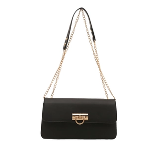 Minimalist black square shoulder bag with gold chain strap and D-ring buckle