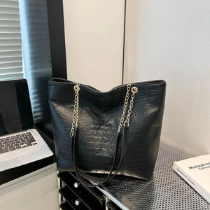 Minimalist black crocodile embossed tote bag with gold chain strap for women