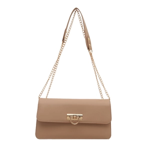 Minimalist beige leather shoulder bag with gold metal clasp and chain strap on white background