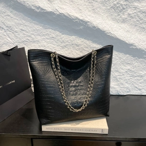 Classic black crocodile pattern tote bag with gold chain strap for women spring 2025