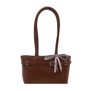 Brown leather tote shoulder bag with vintage buckle strap and decorative bow accent