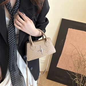 Chic beige woven leather mini bag with silver star detail and stylish top handles