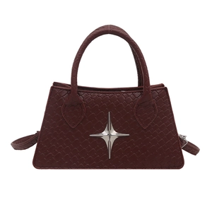 Deep red structured crossbody bag with woven texture and silver star metallic ornament
