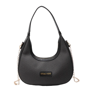 Black woven hobo shoulder bag with leather strap and gold chain decoration