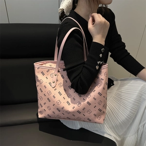 Pink faux leather tote bag with cute bear pattern and spacious shoulder strap design