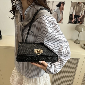 Classic black woven pattern underarm bag with gold metal buckle for women