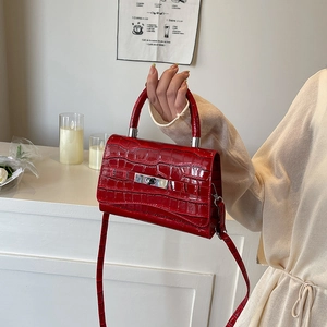 Elegant red crocodile pattern handbag with silver clasp and top handle for women
