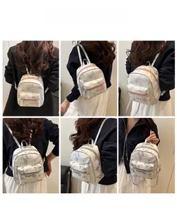 Mini PU backpack with butterfly print shown in multiple angles on a model