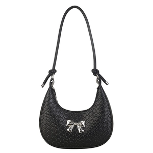 Black woven half-moon handbag with a silver bow and adjustable shoulder strap