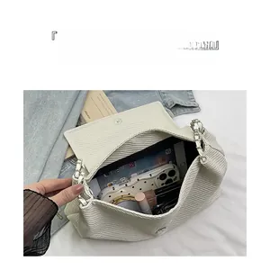 Top view of large woven tote bag interior showing ample storage for daily essentials