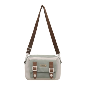 Minimalist green and cream small square crossbody bag with adjustable brown strap
