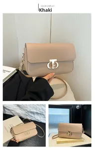 Detail of khaki PU shoulder bag featuring a geometric gold metal twist lock buckle
