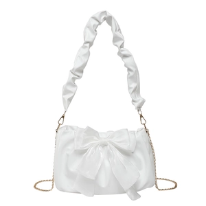 Chic white pleated shoulder bag with large bow detail and elegant gold chain strap