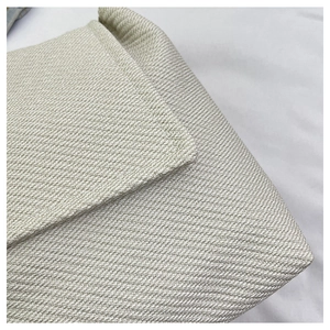 Detailed macro shot of the durable twill woven texture and refined stitching of the bag