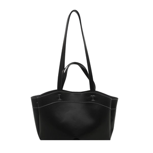 Vintage black tote bag with white contrast stitching and dual handles for shoulder or hand carry
