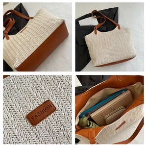Macro detail of large straw tote bag featuring brown leather trim and spacious interior
