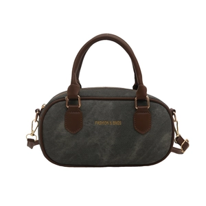Retro denim Boston bag with brown leather handles and gold fashion lettering