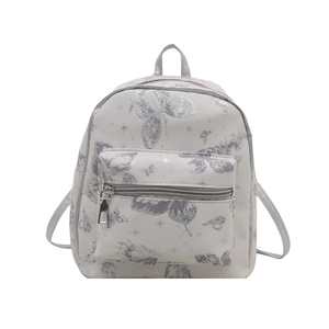 Mini floral butterfly and star print backpack with front pocket and slim straps