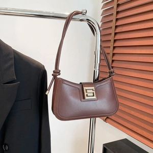 Brown vintage style shoulder bag with silver buckle and knot detail for urban commute
