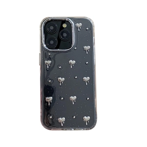 Coque iPhone noire transparente avec cœurs 3D en métal liquide et paillettes Y2K