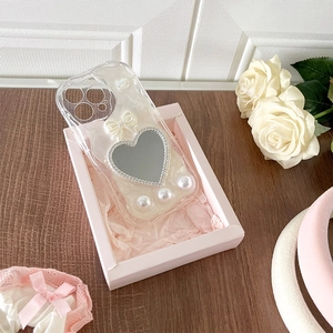 Detail of cherry bow heart mirror phone case with pearls for iPhone 17 Pro Max