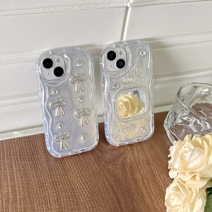 Sparkly iPhone case with rhinestones, mirror, 3D butterfly, and wave edge design